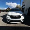 White Chrysler Pacifica with BraunAbility Side Entry Manual Fold Out conversion