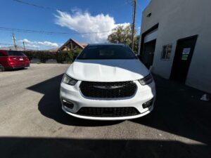 White Chrysler Pacifica with BraunAbility Side Entry Manual Fold Out conversion