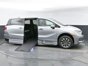 Silver Honda Odyssey with BraunAbility Side Entry Automatic In Floor conversion