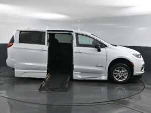 White Chrysler Pacifica with BraunAbility Side Entry Automatic Fold Out conversion