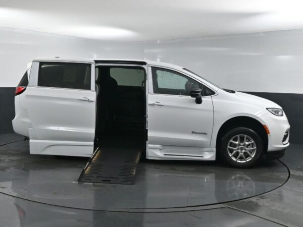 White Chrysler Pacifica with BraunAbility Side Entry Automatic Fold Out conversion