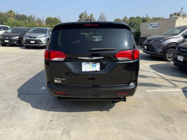 Black Chrysler Voyager with Driverge Side Entry Automatic Fold Out conversion