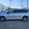 Silver Chrysler Pacifica with Driverge Rear Entry Manual Fold Out conversion