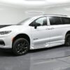 White Chrysler Pacifica with BraunAbility Side Entry Automatic Fold Out conversion