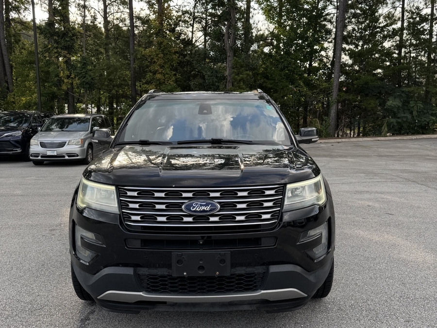 Black Ford Explorer with BraunAbility Side Entry Automatic In Floor conversion