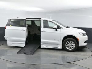 White Chrysler Voyager with BraunAbility Side Entry Automatic In Floor conversion