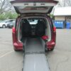 Red Chrysler Voyager with Driverge Rear Entry Manual Fold Out conversion