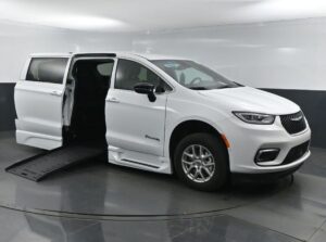 White Chrysler Pacifica with BraunAbility Side Entry Automatic Fold Out conversion