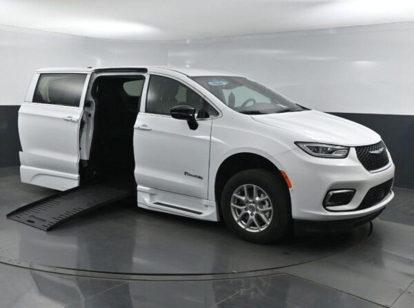 White Chrysler Pacifica with BraunAbility Side Entry Automatic Fold Out conversion
