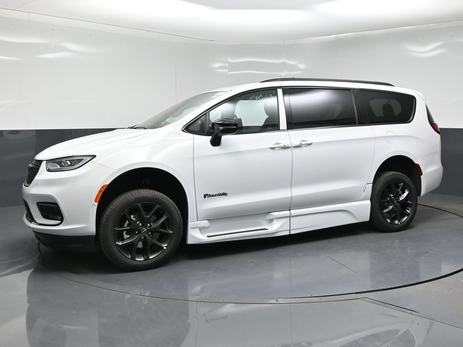 White Chrysler Pacifica with BraunAbility Side Entry Automatic Fold Out conversion