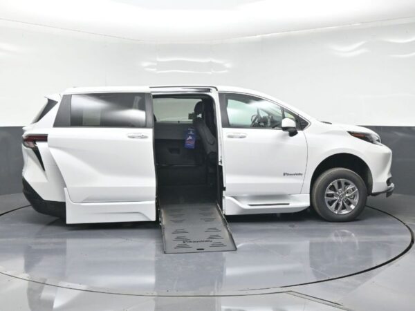 White Toyota Sienna with BraunAbility Side Entry Automatic Fold Out conversion