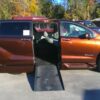 Orange Toyota Sienna with BraunAbility Side Entry Automatic Fold Out conversion