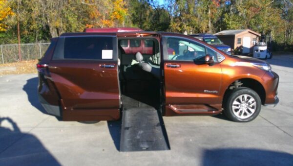 Orange Toyota Sienna with BraunAbility Side Entry Automatic Fold Out conversion