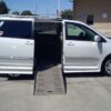White Toyota Sienna with BraunAbility Side Entry Automatic Fold Out conversion