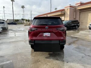 Red Toyota Sienna with Vantage Mobility Rear Entry Manual Fold Out conversion