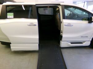White Honda Odyssey with BraunAbility Side Entry Automatic In Floor conversion