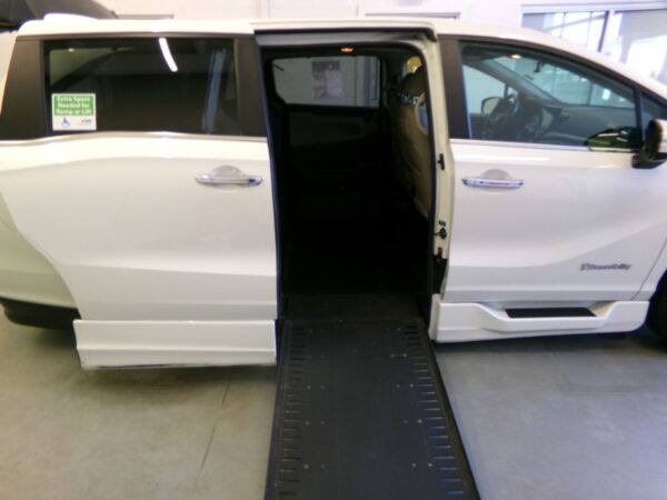 White Honda Odyssey with BraunAbility Side Entry Automatic In Floor conversion