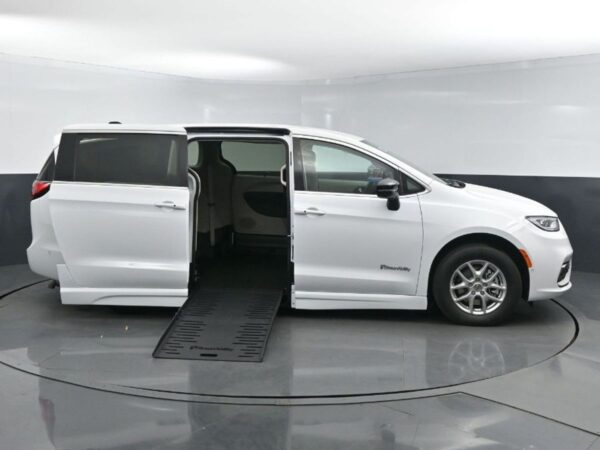 White Chrysler Pacifica with BraunAbility Side Entry Automatic Fold Out conversion