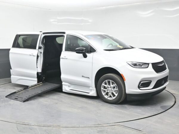 White Chrysler Pacifica with BraunAbility Side Entry Automatic Fold Out conversion