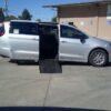 Silver Chrysler Pacifica with Driverge Side Entry Automatic Fold Out conversion