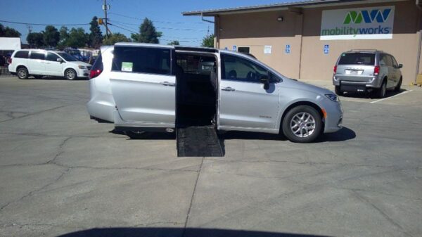 Silver Chrysler Pacifica with Driverge Side Entry Automatic Fold Out conversion