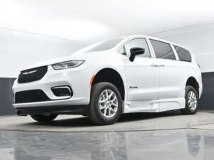 White Chrysler Pacifica with BraunAbility Side Entry Automatic Fold Out conversion