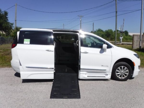 White Chrysler Pacifica with BraunAbility Side Entry Automatic Fold Out conversion