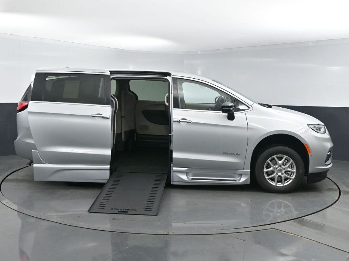 Silver Chrysler Pacifica with BraunAbility Side Entry Automatic In Floor conversion