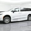 White Chrysler Pacifica with BraunAbility Side Entry Automatic Fold Out conversion