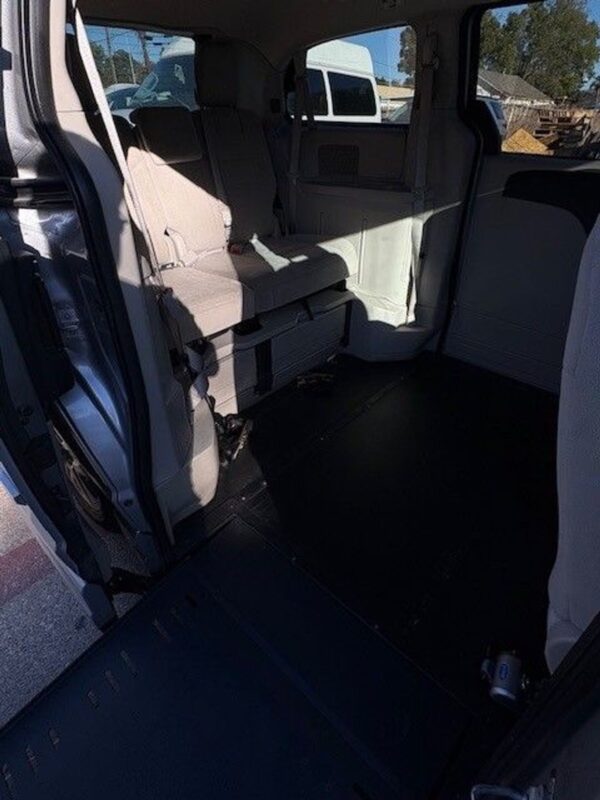 Silver Dodge Grand Caravan with BraunAbility Side Entry Automatic Fold Out conversion
