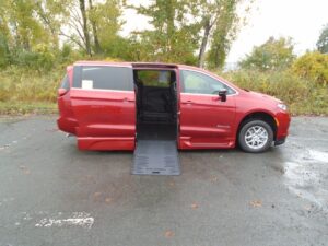 Red Chrysler Pacifica with BraunAbility Side Entry Automatic Fold Out conversion