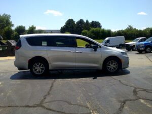 Silver Chrysler Pacifica with Driverge Rear Entry Manual Fold Out conversion