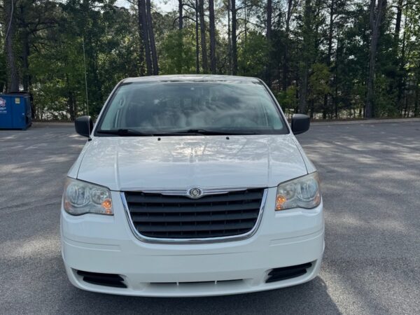 White Chrysler Town and Country with BraunAbility Side Entry Automatic Fold Out conversion