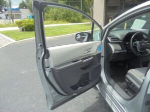 Silver Toyota Sienna with Driverge Rear Entry Manual Fold Out conversion