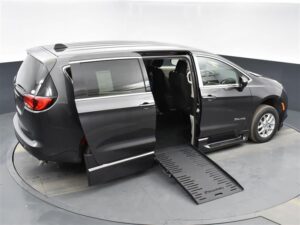 Black Chrysler Voyager with BraunAbility Side Entry Automatic Fold Out conversion