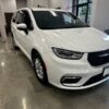 White Chrysler Pacifica with Driverge Rear Entry Manual Fold Out conversion