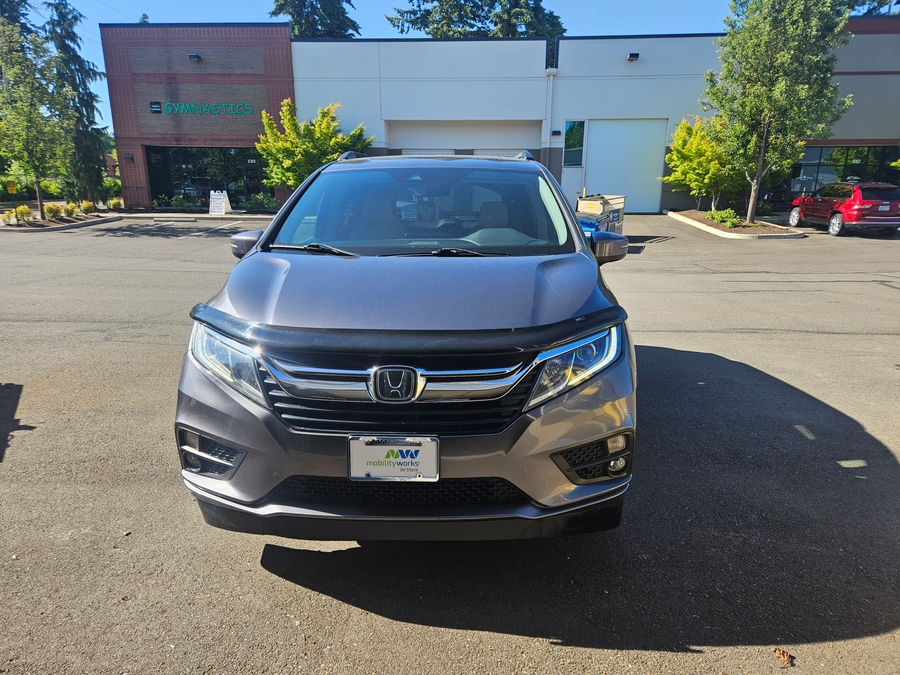 Grey Honda Odyssey with Vantage Mobility Side Entry Automatic In Floor conversion
