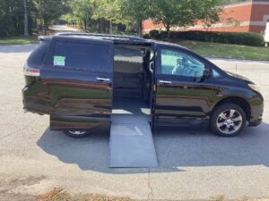 Black Toyota Sienna with Vantage Mobility Side Entry Automatic In Floor conversion