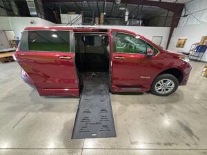 Red Toyota Sienna with BraunAbility Side Entry Automatic Fold Out conversion