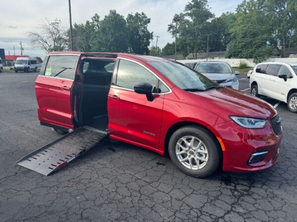 Red Chrysler Pacifica with Driverge Side Entry Automatic Fold Out conversion