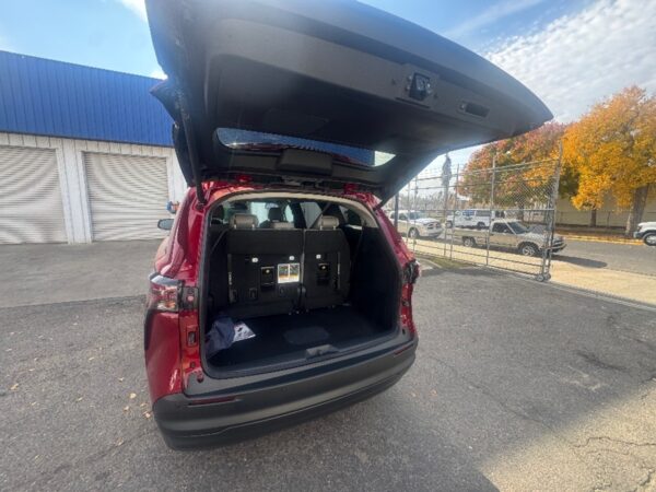 Red Toyota Sienna with BraunAbility Side Entry Automatic Fold Out conversion