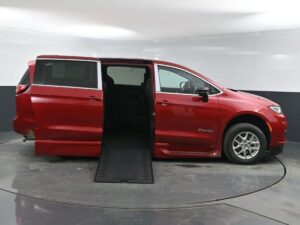Red Chrysler Pacifica with BraunAbility Side Entry Automatic In Floor conversion