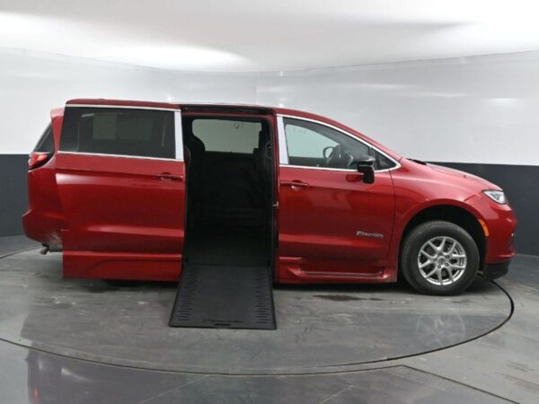 Red Chrysler Pacifica with BraunAbility Side Entry Automatic In Floor conversion