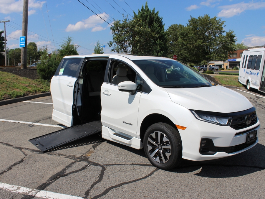 White Honda Odyssey with BraunAbility Side Entry Automatic In Floor conversion