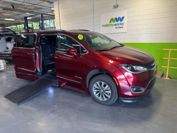 Red Chrysler Pacifica with BraunAbility Side Entry Automatic In Floor conversion