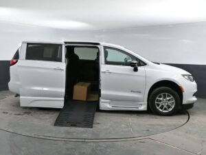 White Chrysler Voyager with BraunAbility Side Entry Automatic Fold Out conversion