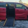 Red Honda Odyssey with BraunAbility Side Entry Automatic In Floor conversion