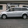 Silver Dodge Grand Caravan with BraunAbility Rear Entry Manual Fold Out conversion