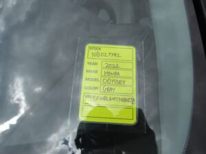 Grey Honda Odyssey with BraunAbility Side Entry Automatic In Floor conversion