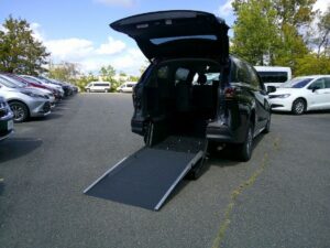 Black Toyota Sienna with Driverge Rear Entry Manual Fold Out conversion